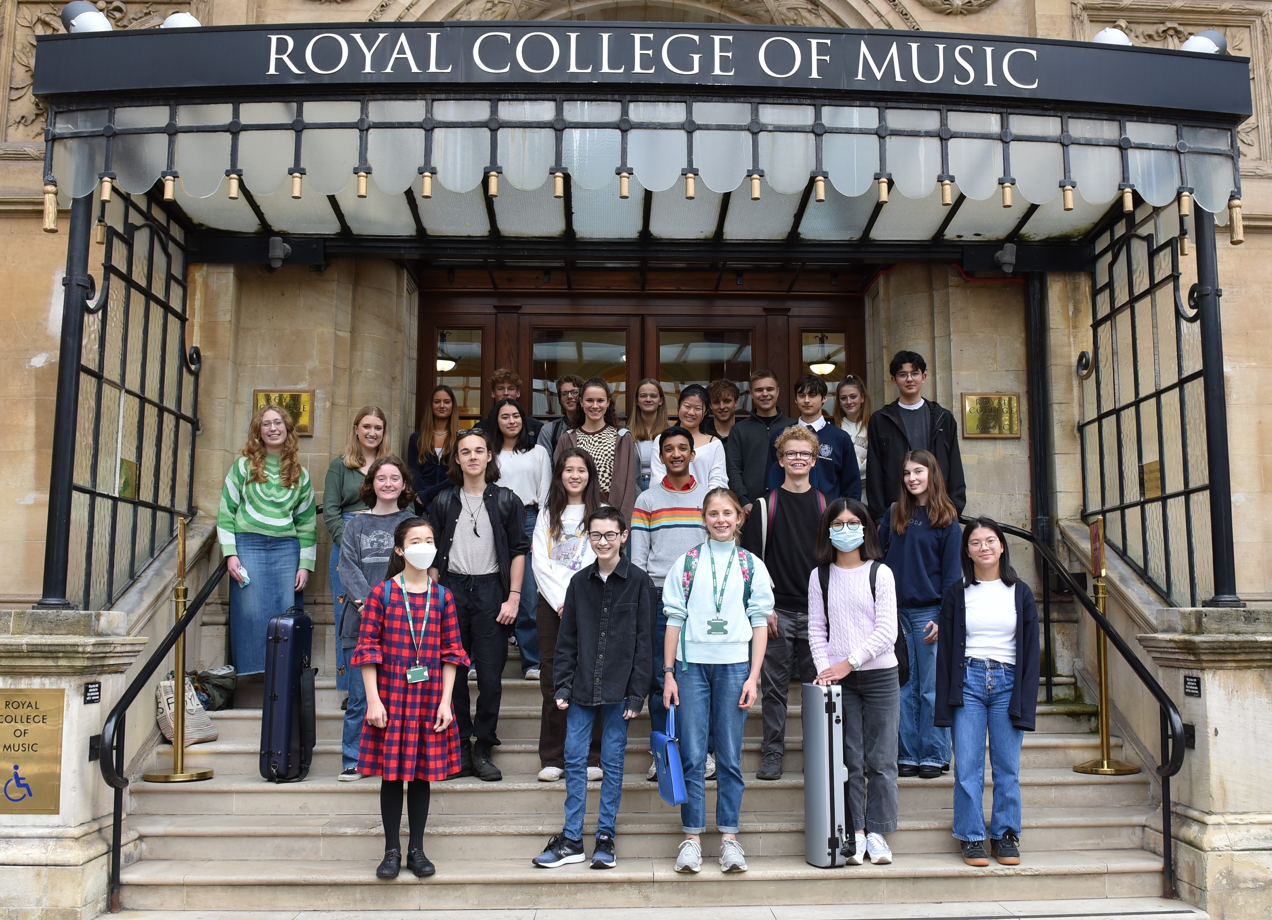 Junior department students stood on the steps outside the RCM